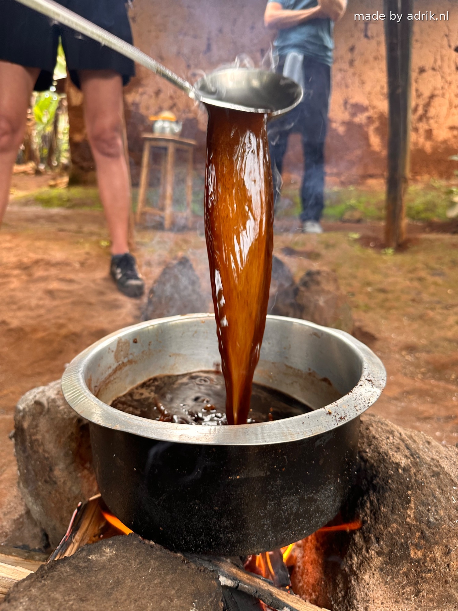 Traditional coffee brewing on open fire during cultural safari tour in Tanzania